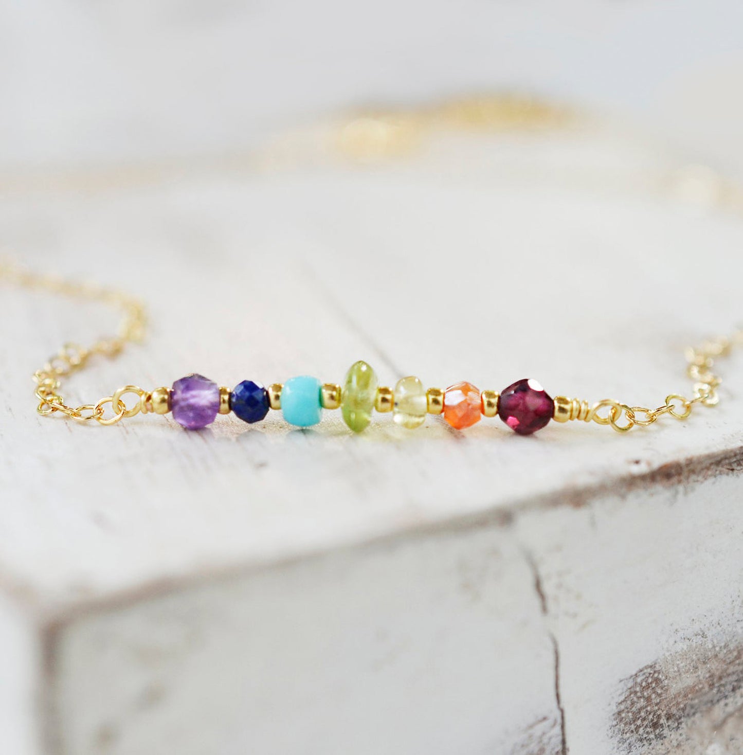 Rainbow Crystal Chakra Necklace, Handmade by GEMNIA. Stone chakra pendant on gold or silver chain.
