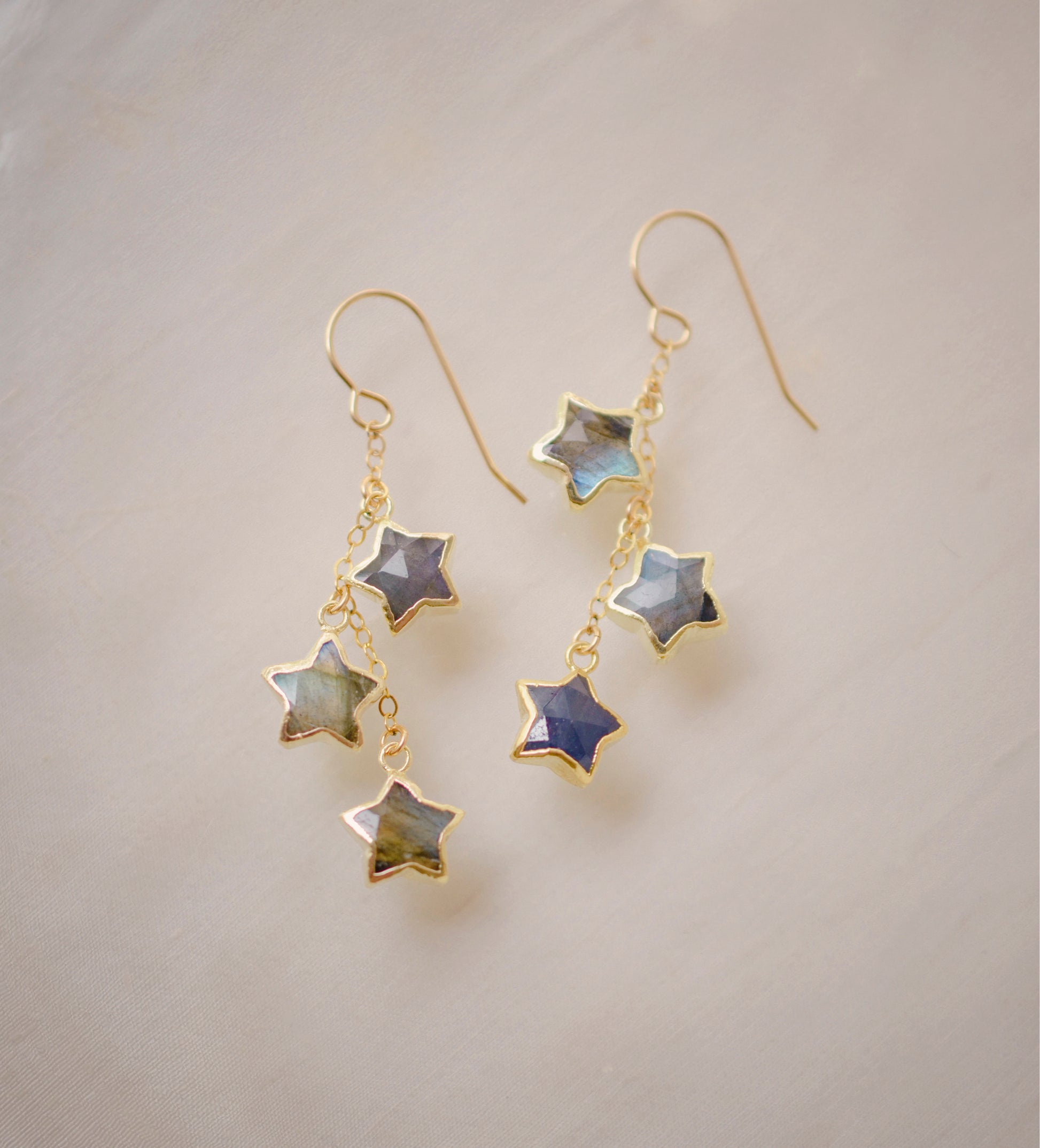 Three labradorite star shaped gemstones hang from each earring. Shown in gold filled.