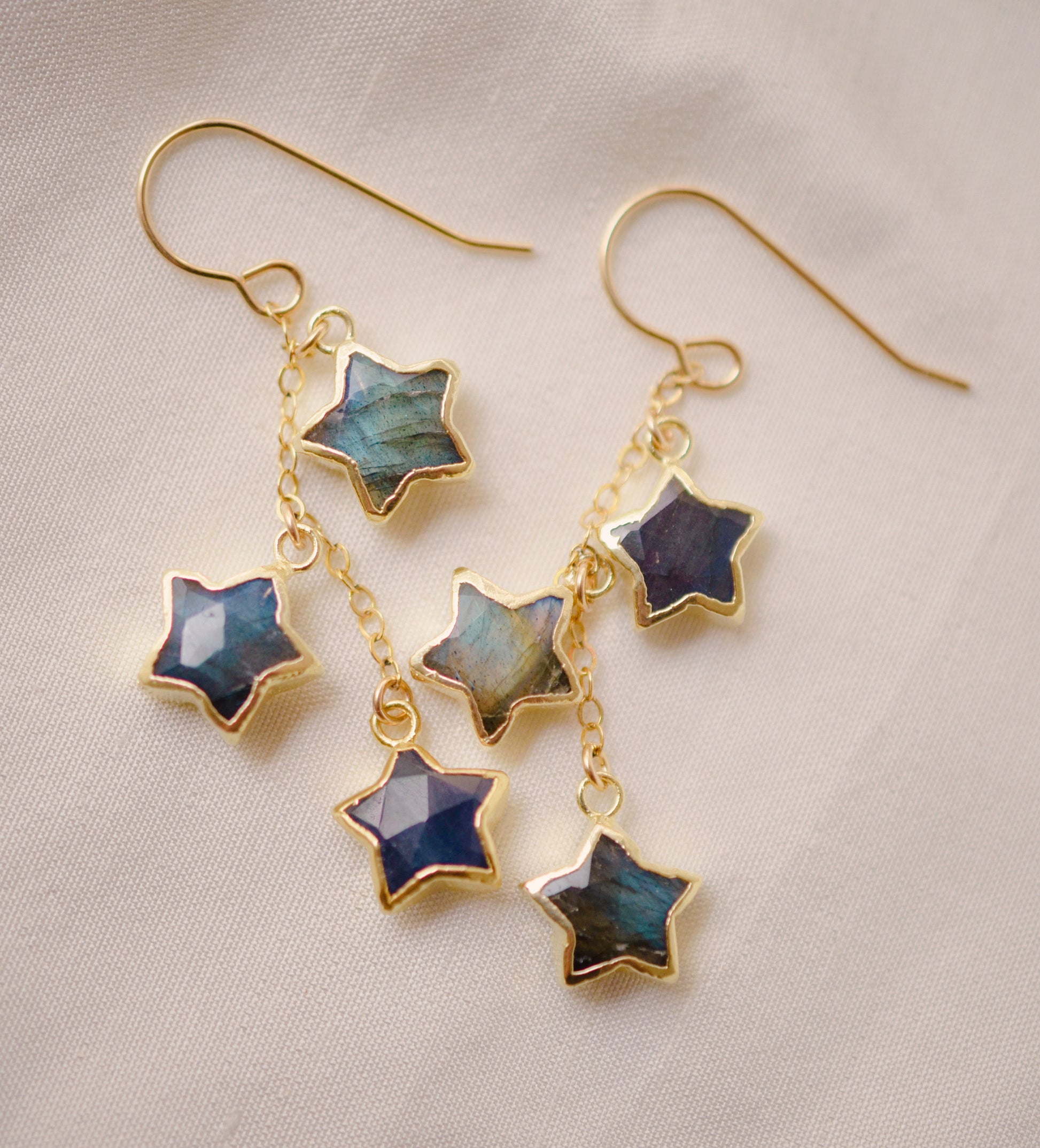 Three labradorite star shaped gemstones hang from each earring. Shown in gold filled.