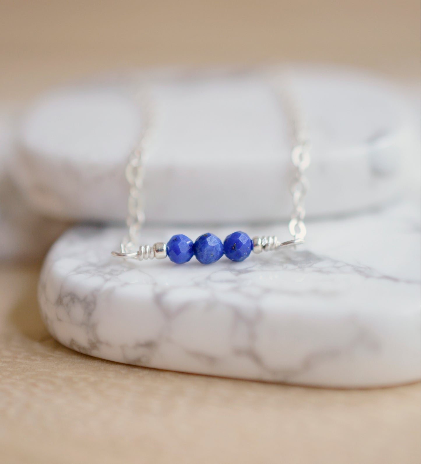 Three genuine Lapis Lazuli stones set onto a sterling silver chain. Handmade Jewelry by GEMNIA.