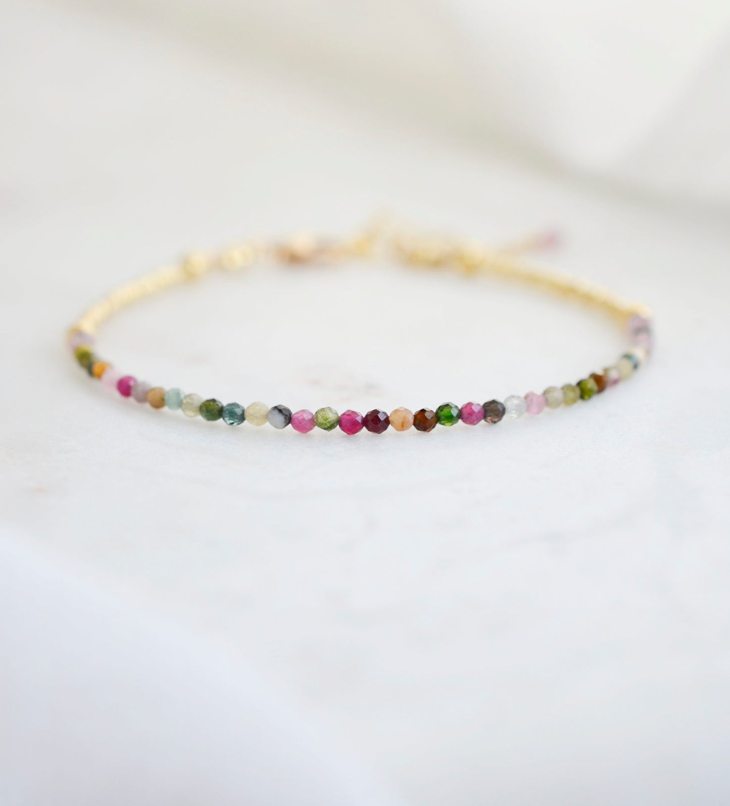 Gold style of multi-color tourmaline beaded bracelet.