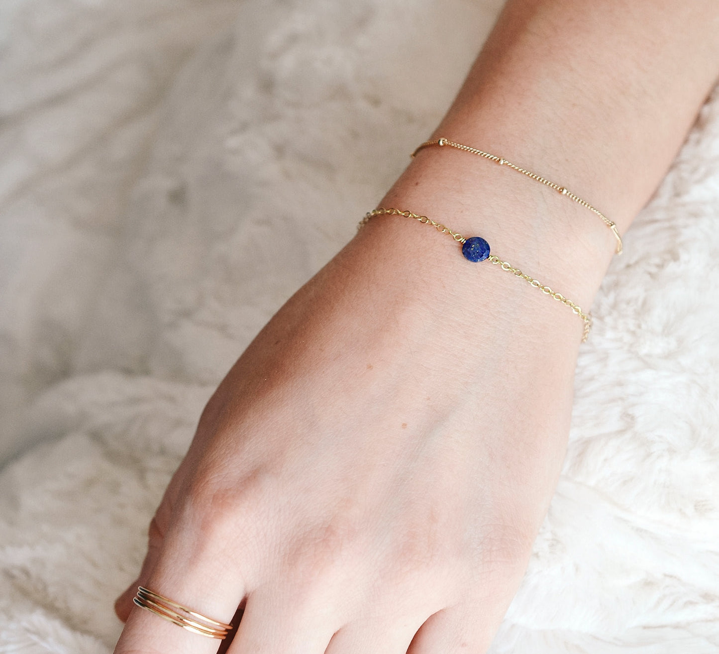 Dainty blue Lapis Lazuli coin bracelet on a sterling silver or gold filled chain.