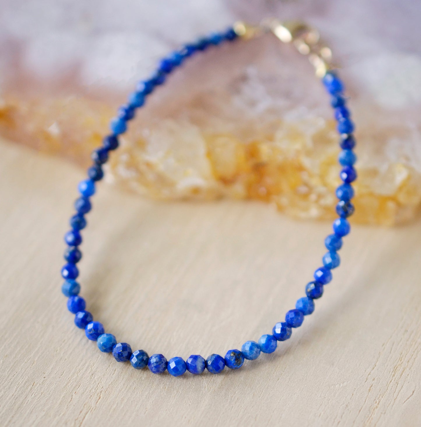 Minimalist Lapis Lazuli bracelet. Handmade with small 3mm natural lapis beads and set onto a sterling silver or 14k gold filled clasp.