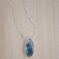 Labradorite Teardrop Necklace, Genuine labradorite bezeled in gold and suspended from a gold chain. Handmade by GEMNIA.