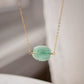 Aqua blue amazonite slice gemstone set onto a 14k gold filled chain. The stone is semi oval in shape, but irregular. It's smooth polished, but with raw edges.