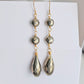 Long, handmade pyrite dangle earrings in 14k gold filled.