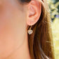 Dainty, handcrafted rose quartz heart earrings featuring a faceted, sparkling heart—the stone of universal love. These gentle dangles, approximately 0.5 inches (12mm/1.2cm) in size, are modeled in 14k gold filled. They make a sweet and romantic gift for wife, girlfriend, or anniversary. 