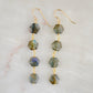 Long labradorite earrings with hexagon shaped gemstones in a long dangle style. The metal is 14k gold filled or sterling silver. 