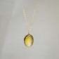 Labradorite oval pendant with yellow-green flash. The chain in 14k gold filled. 