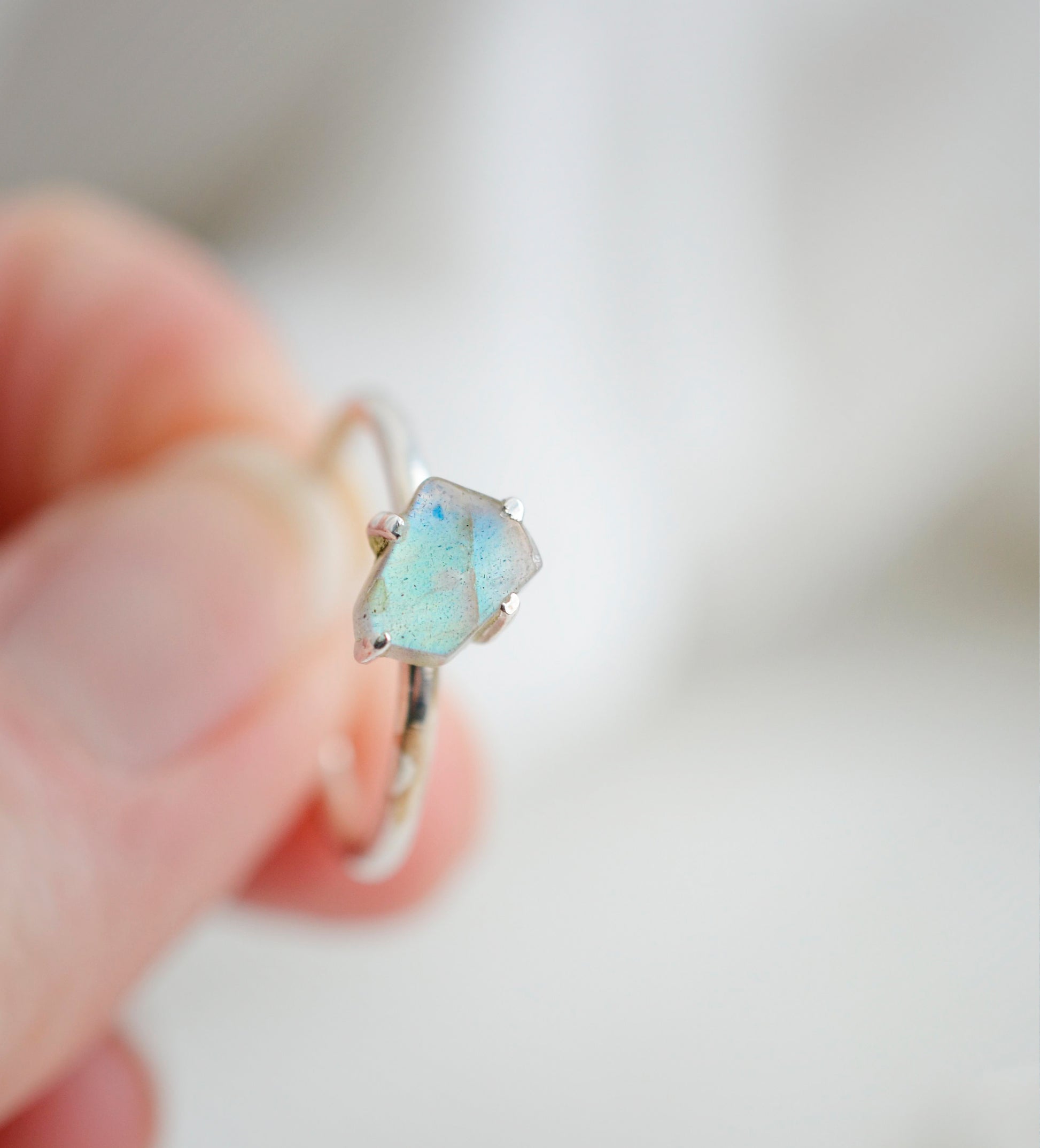 Close up of the blue-green flash in the labradorite silver ring.