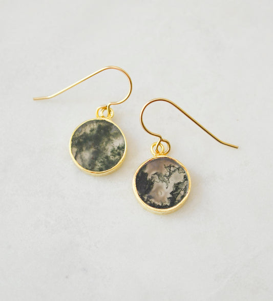 Smooth polished flat circle moss agate earrings shown in gold filled.