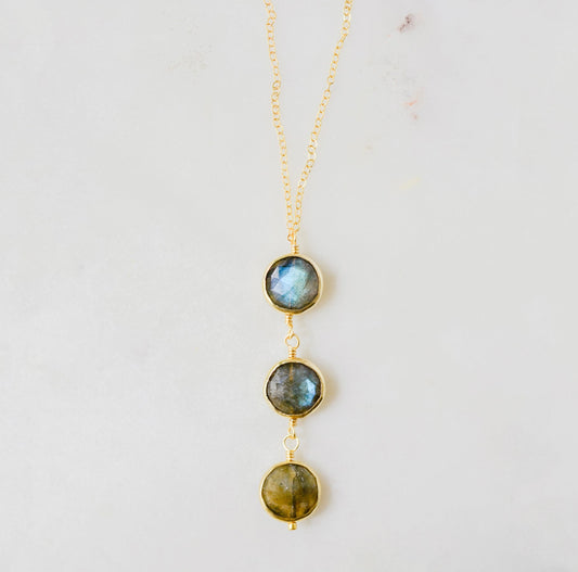 A handmade necklace with three natural Labradorite stones on a 14k gold filled chain.