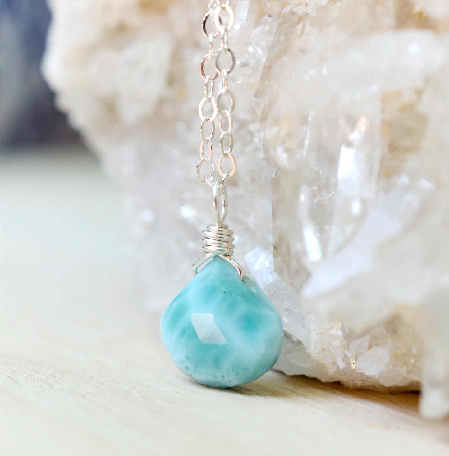 Blue Larimar pendant set onto a sterling silver chain.