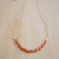 Sunstone Necklace with small faceted sunstone gems set onto a sterling silver or gold filled chain. 