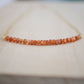 Sunstone Necklace with small faceted sunstone gems set onto a sterling silver or gold filled chain. 